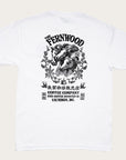 A white t-shirt featuring a black printed design of three horse heads and floral elements, with the text 'FERNWOOD COFFEE COMPANY'.