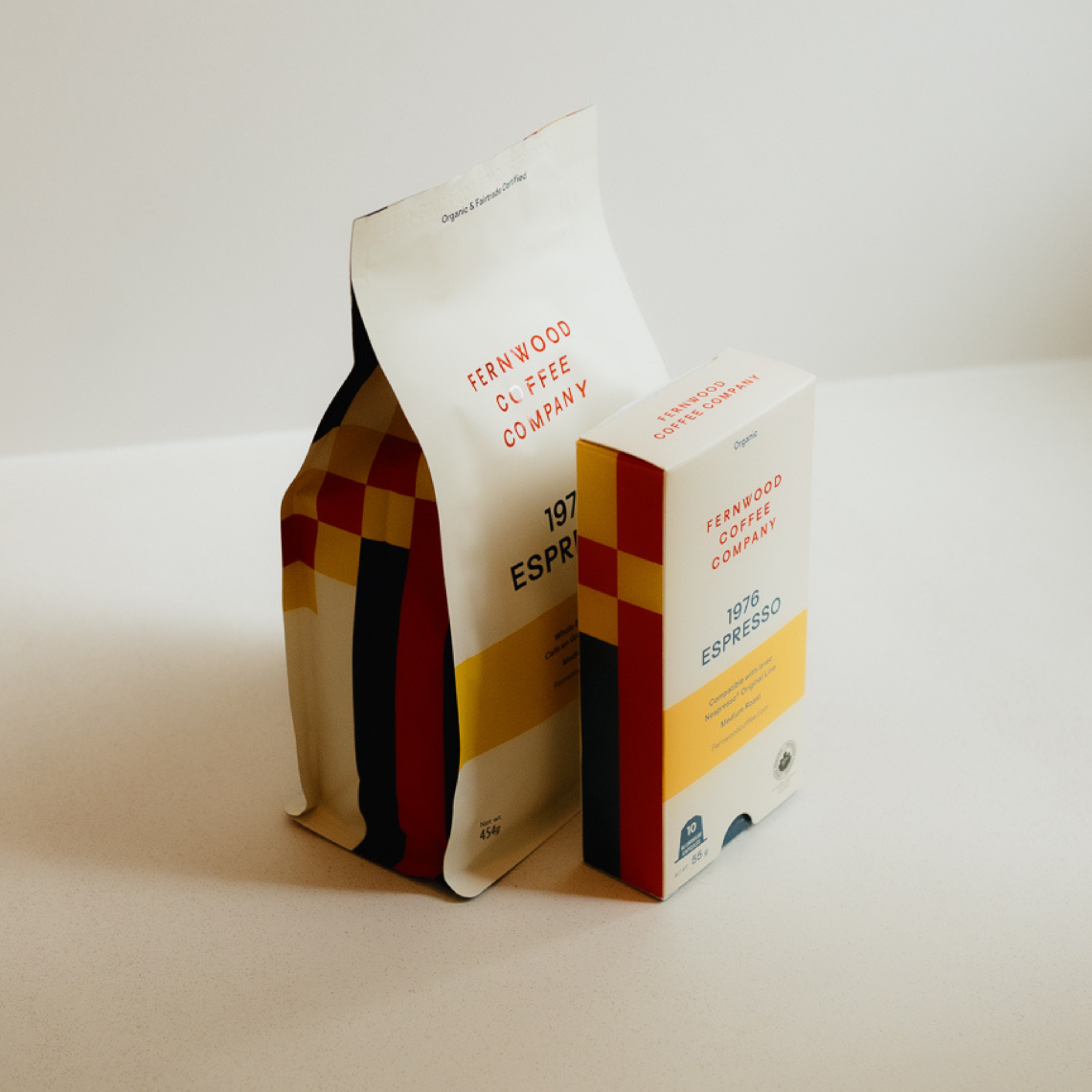 1976 Espresso bag of beans with a 1976 Espresso coffee capsules box.