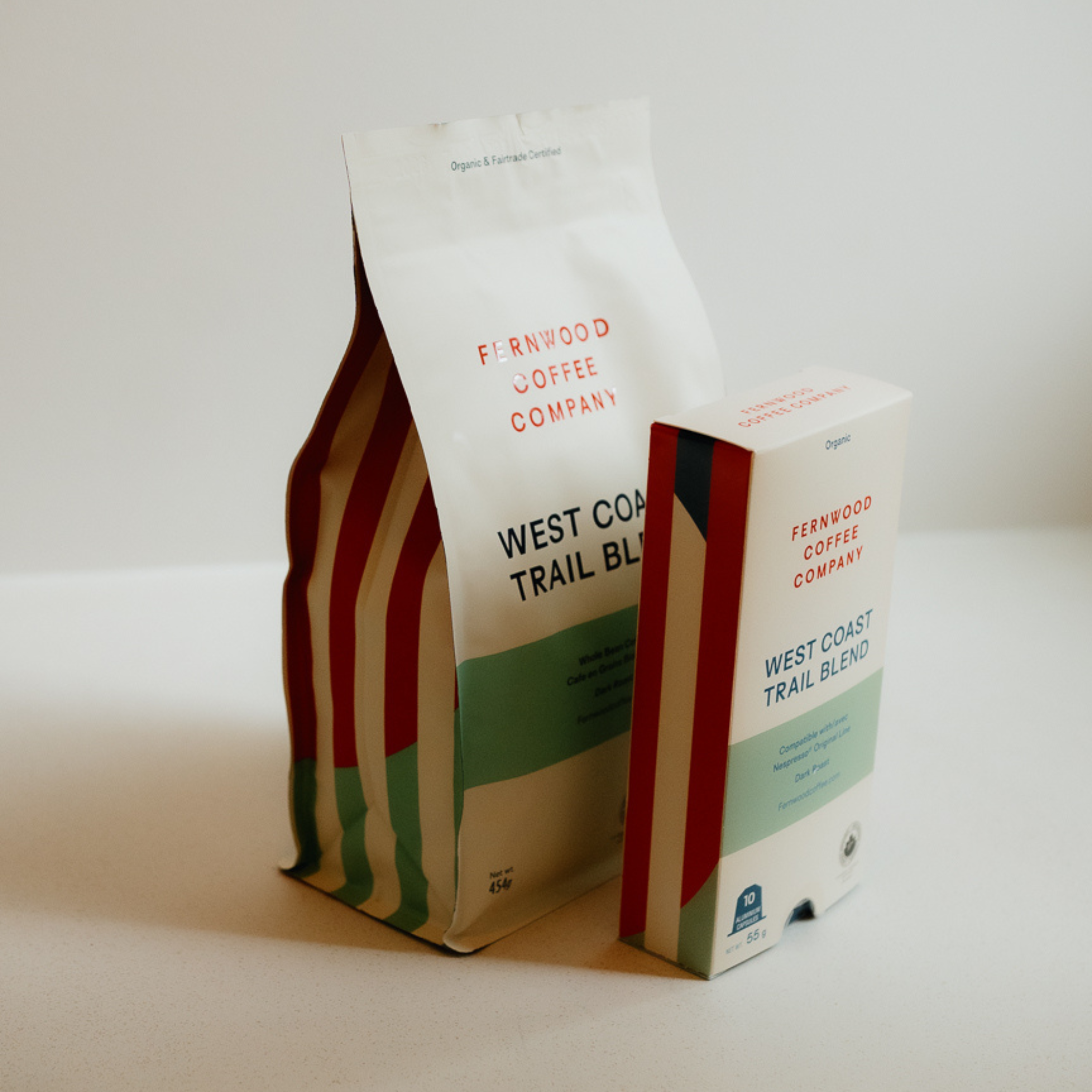 A bag of Fernwood West Coast Trail Beans with a box of capsules on a white counter.