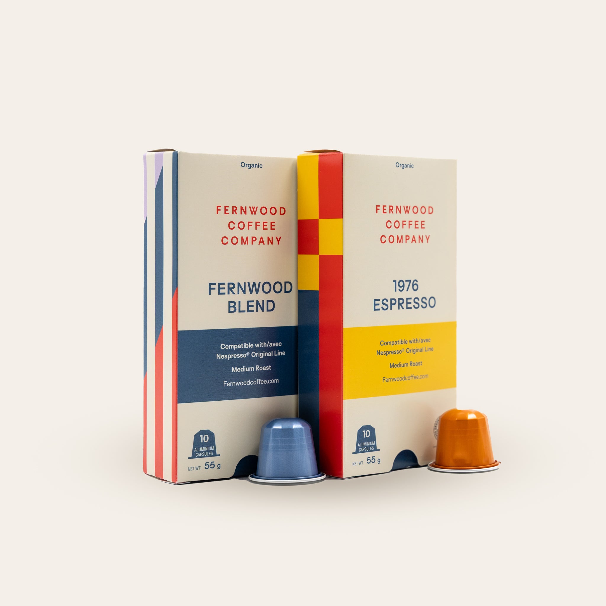 Two boxes of Fernwood Coffee Company coffee capsules on a beige background