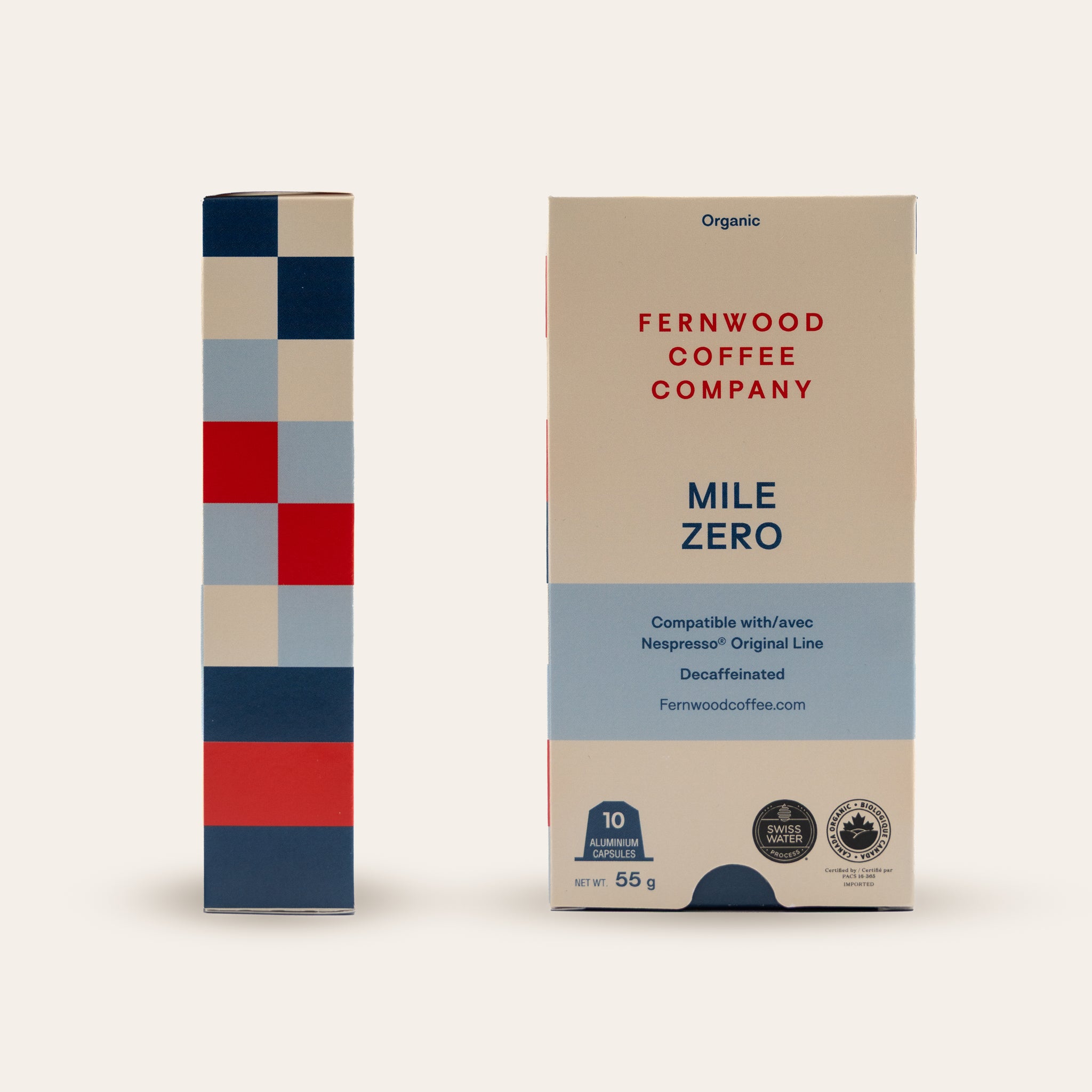 Two Mile Zero Decaf capsule offee boxes from Fernwood Coffee Company on a beige background