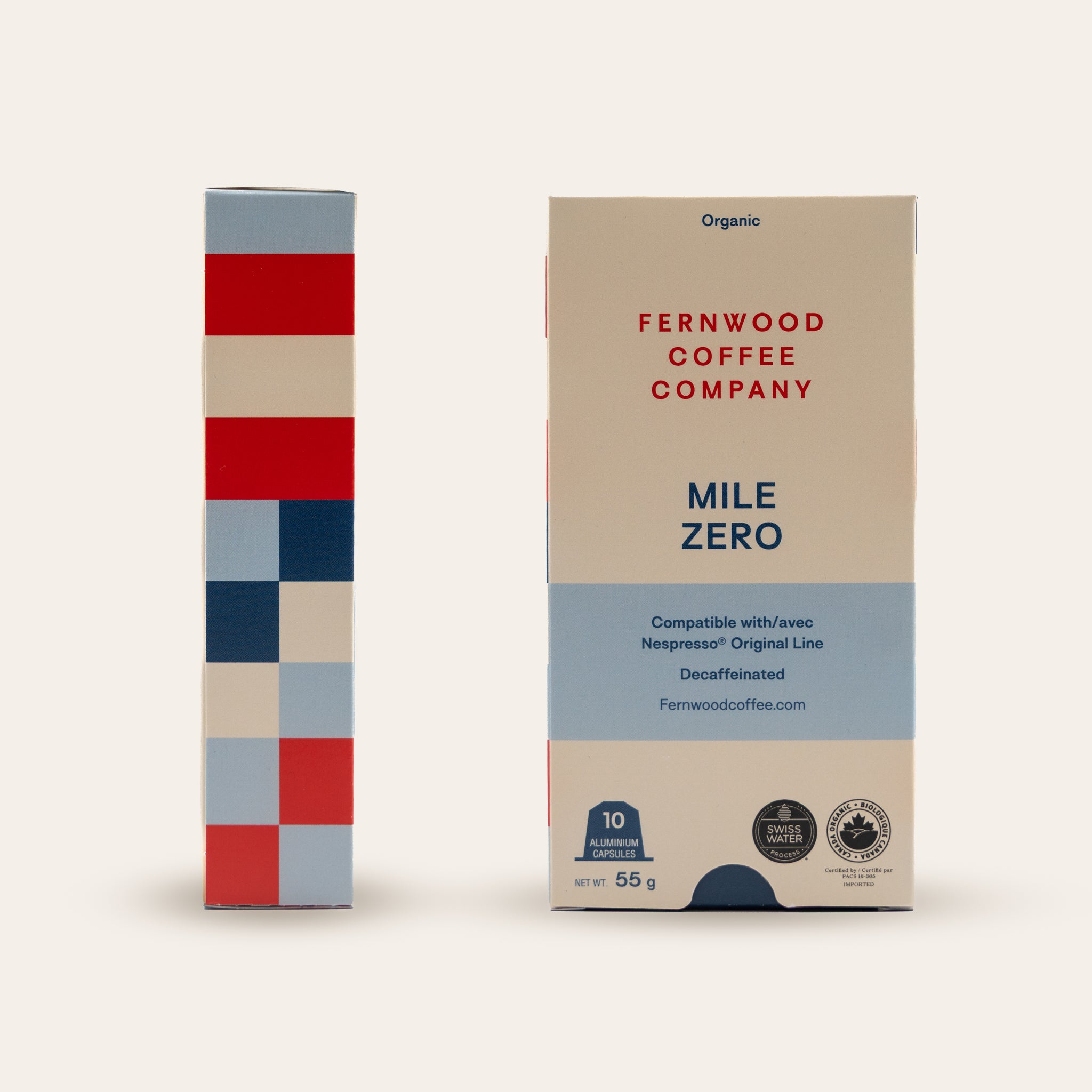 Two Mile Zero Decaf capsule offee boxes from Fernwood Coffee Company on a beige background