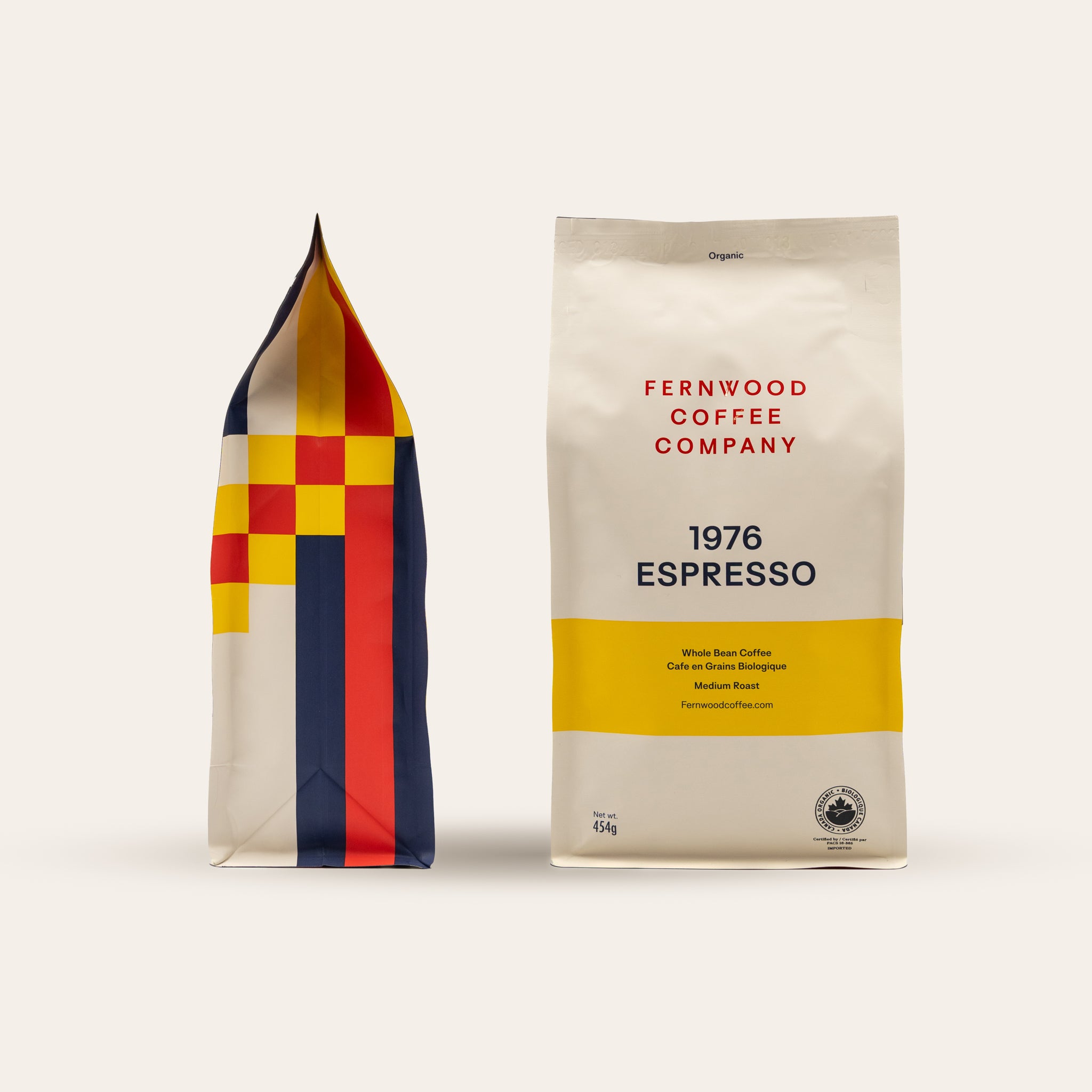 Two 1976 Espresso coffee bags from Fernwood Coffee Company on beige background