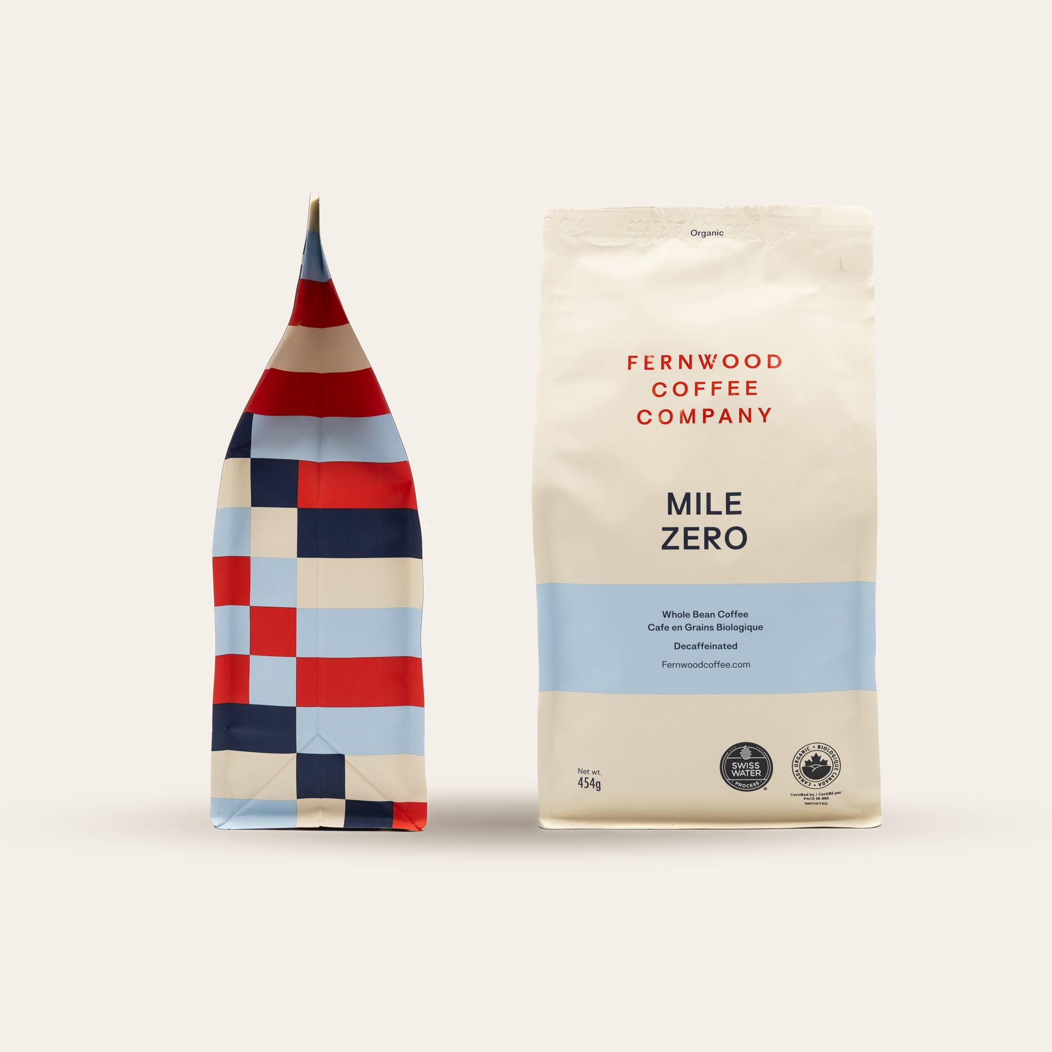 Two mile zero coffee bags from Fernwood Coffee Company on a light beige background