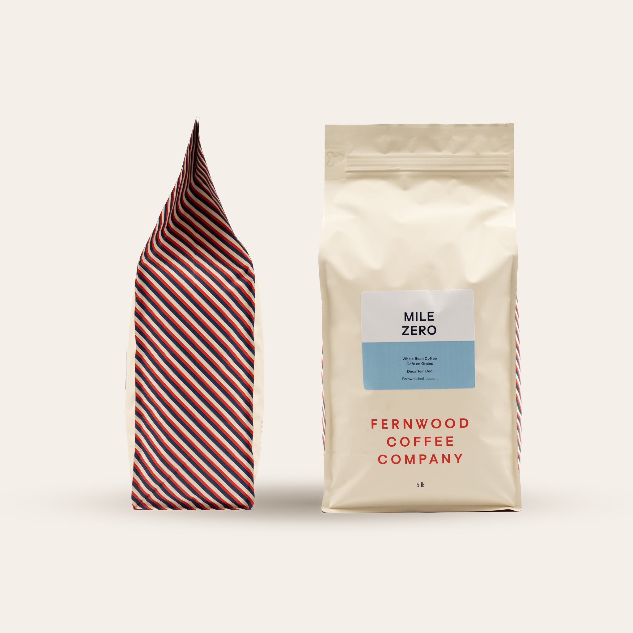 A 5lb bag of Mile Zero Coffee on a beige background.