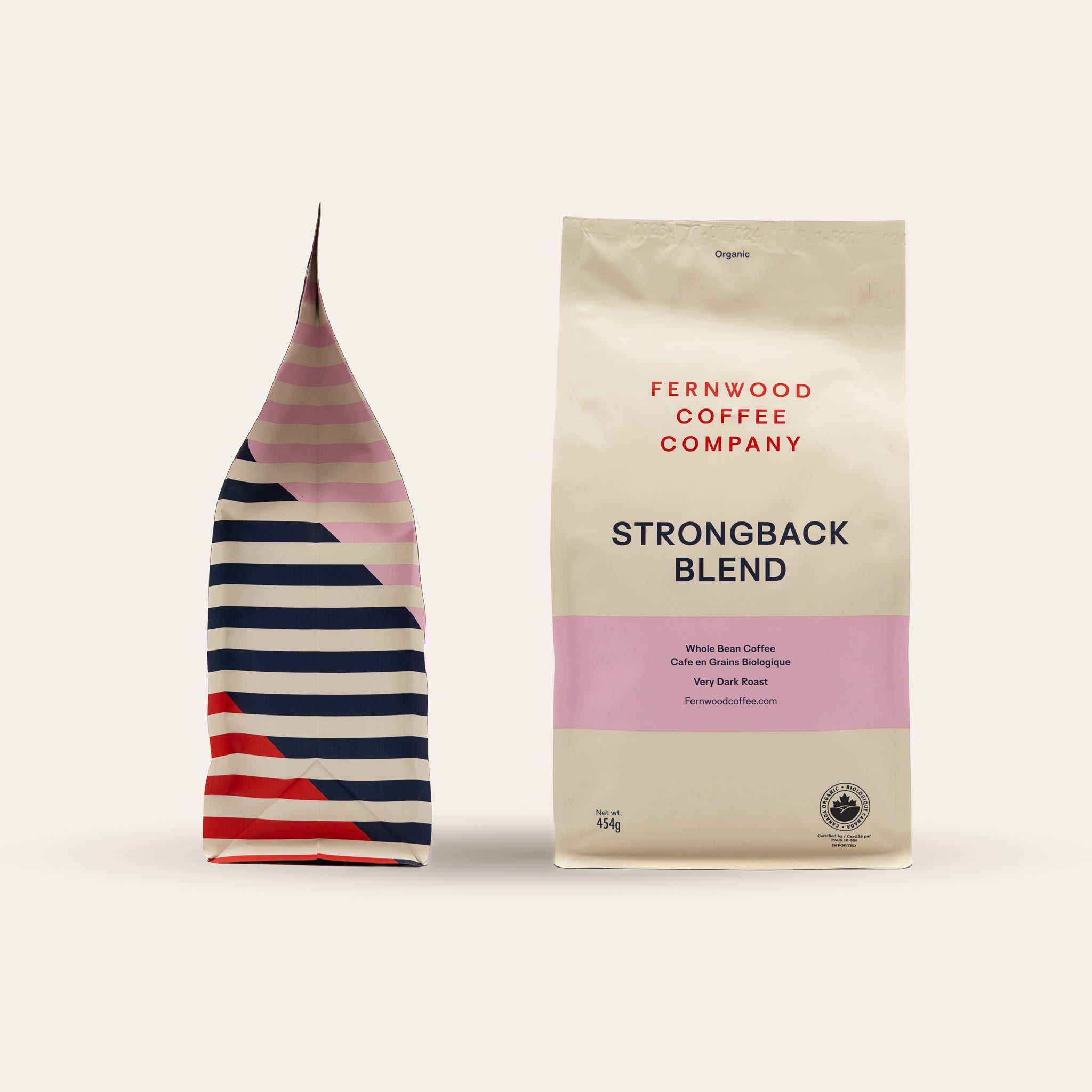 Fernwood Coffee Company Strongback Blend coffee bag with a striped bag on a light beige background