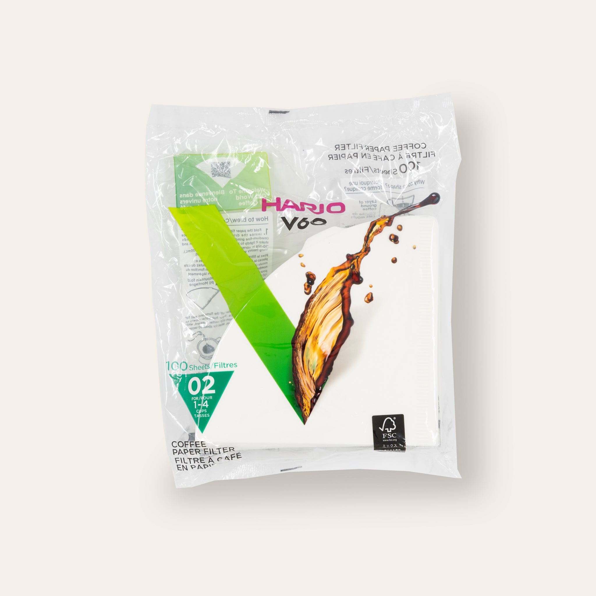 Hario V60 coffee filter packaging on a beige background