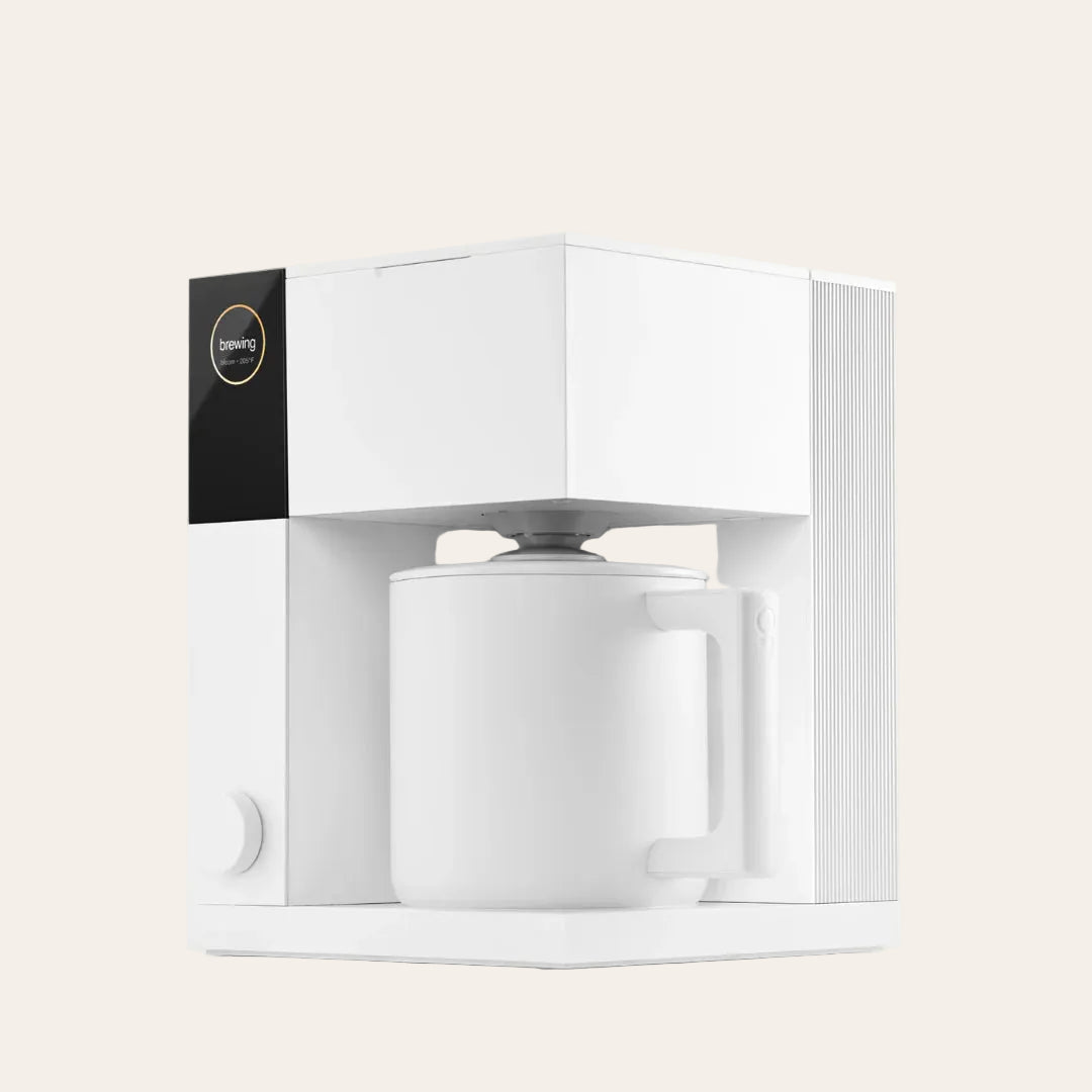 White electronic device with a black label on a light beige background