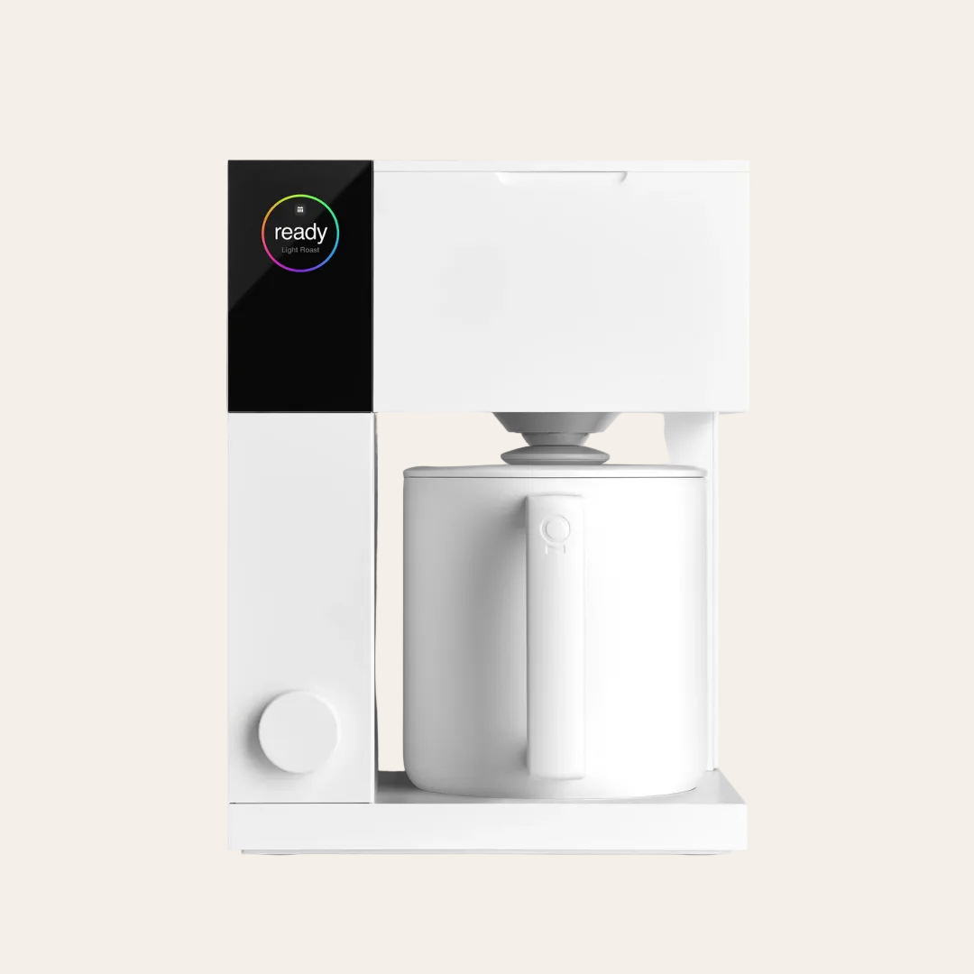 Fellow coffee maker front view on a beige coloured background