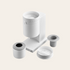 White cylindrical grinder with various components on a beige background