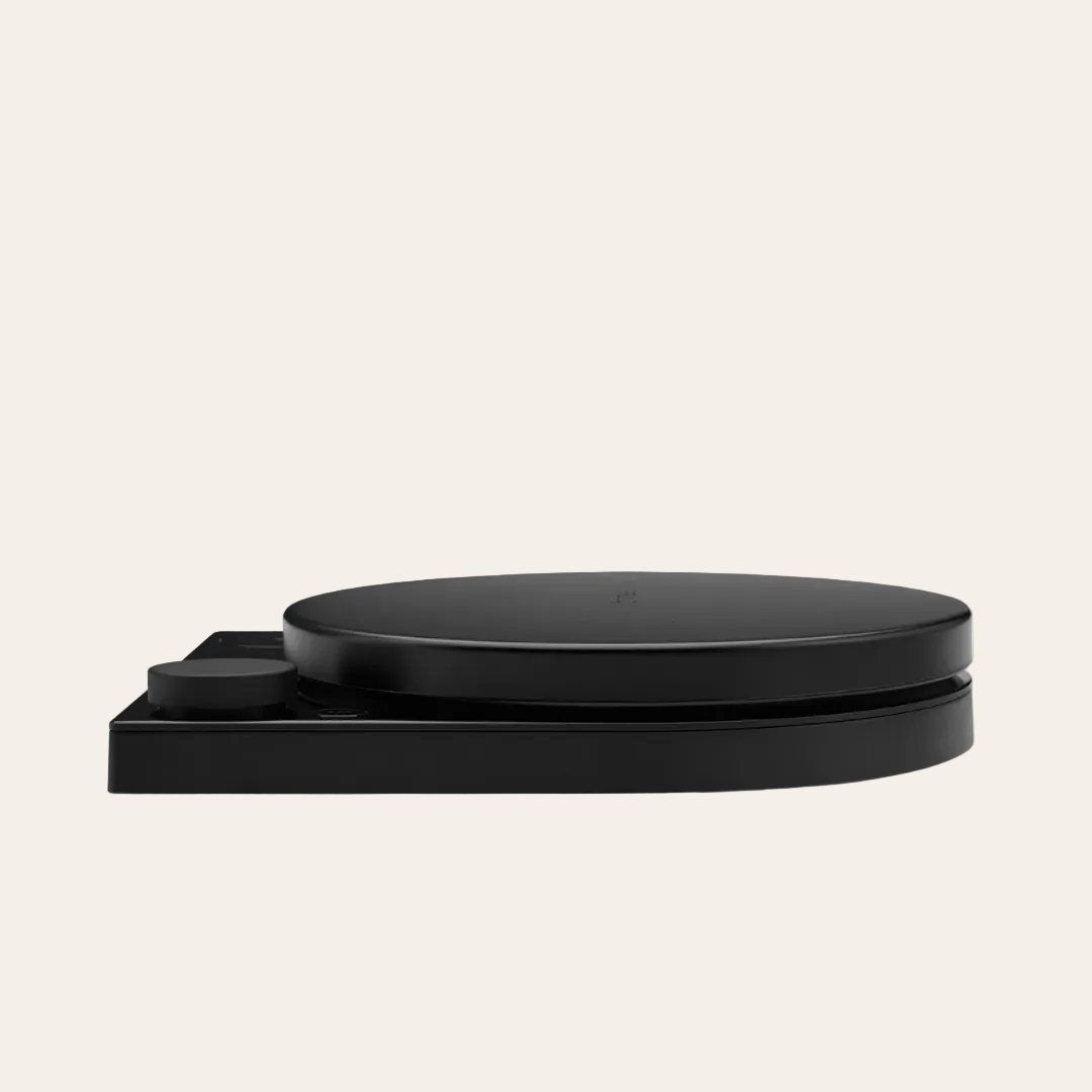 Black electronic device on a beige background