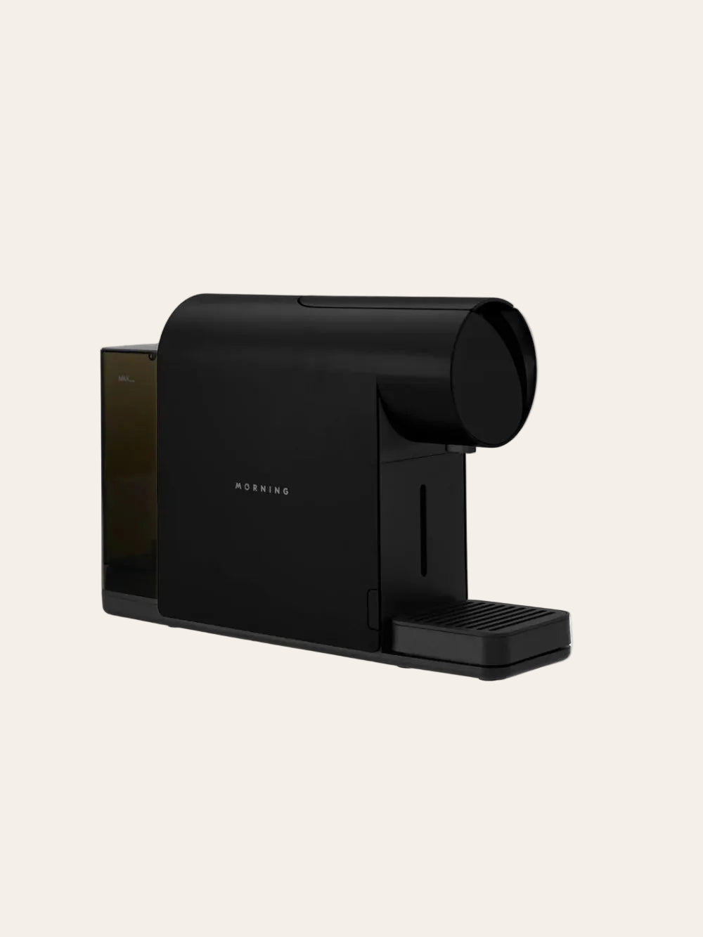 White and black coffee machine on a beige background