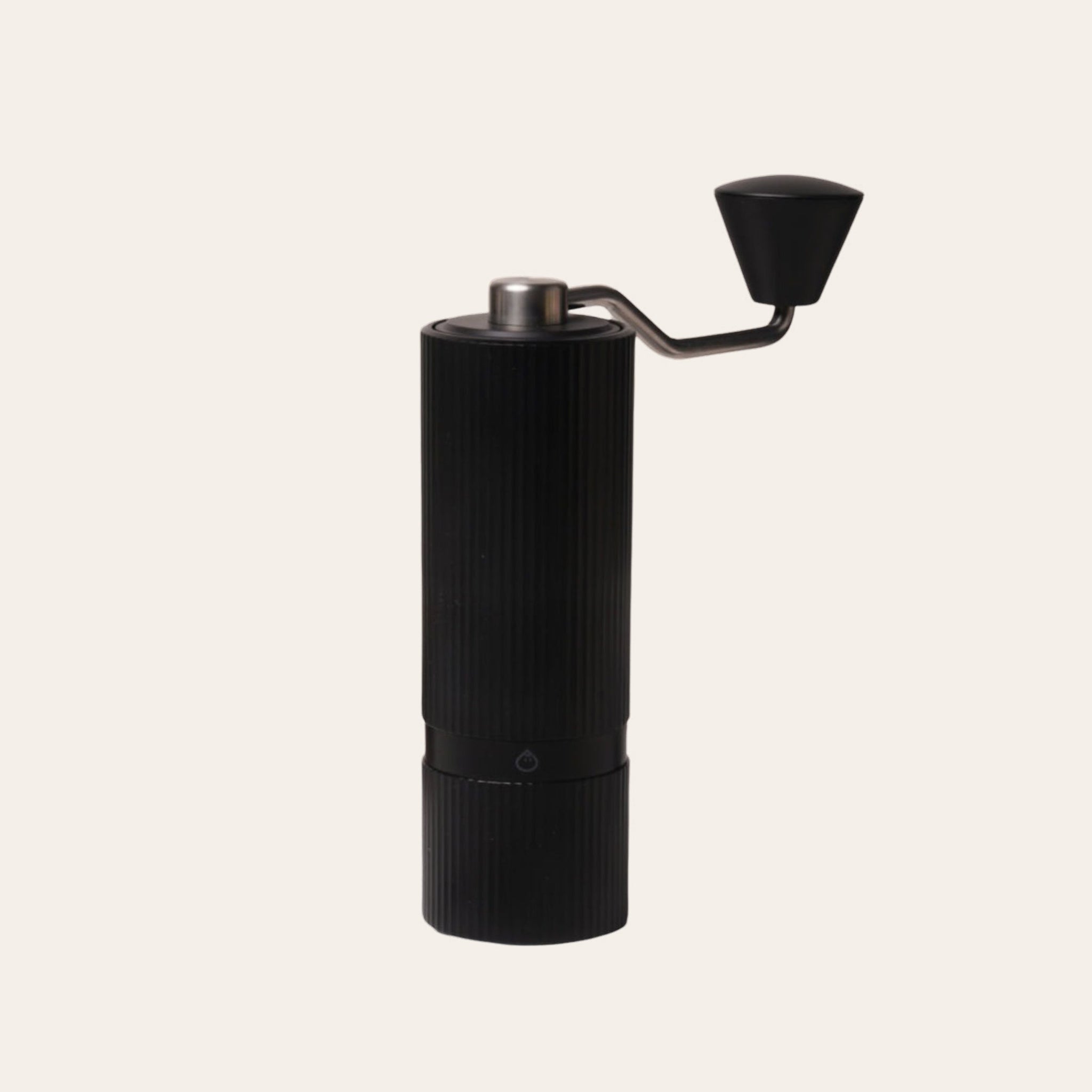 Black Nuttii Goosey hand coffee grinder with a fluted body and conical handle knob