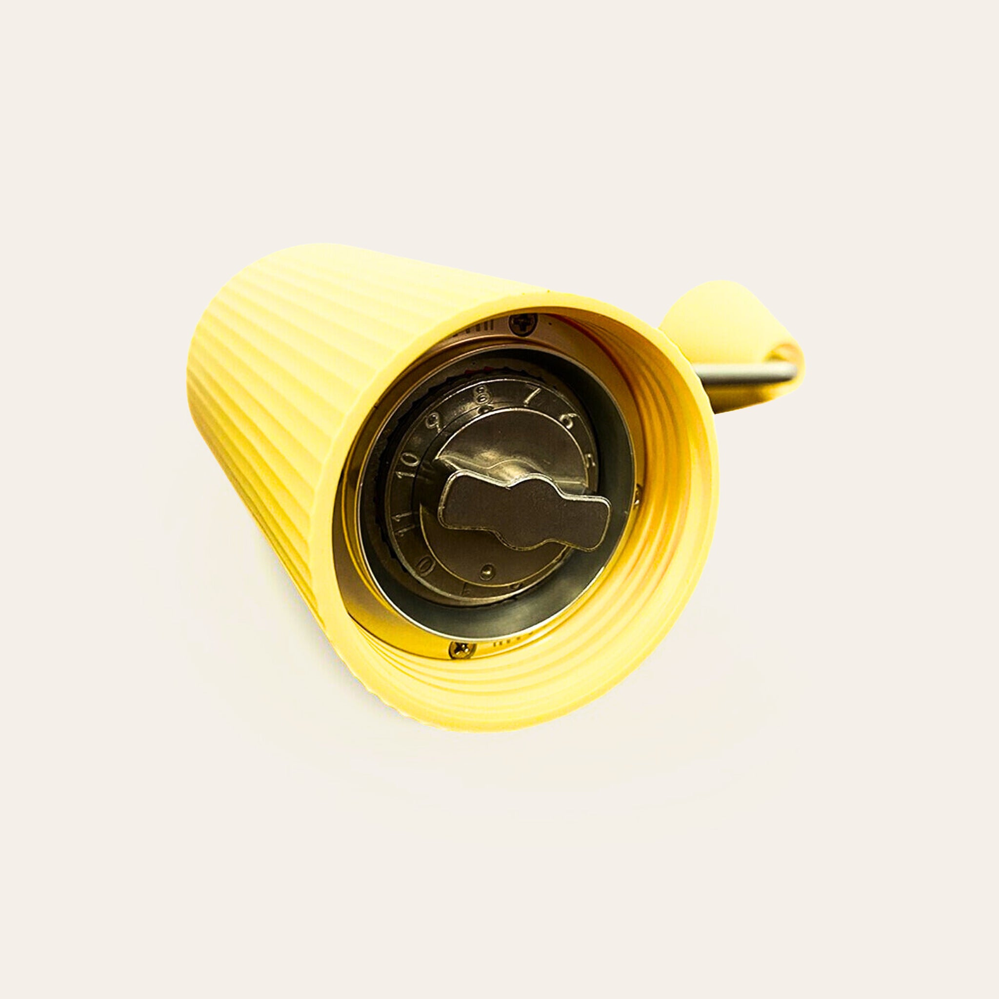 Inside the yellow Nuttii Goosey grinder, showing the 38mm stainless steel burr