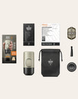 Wacaco Nanopresso coffee maker components on a beige background