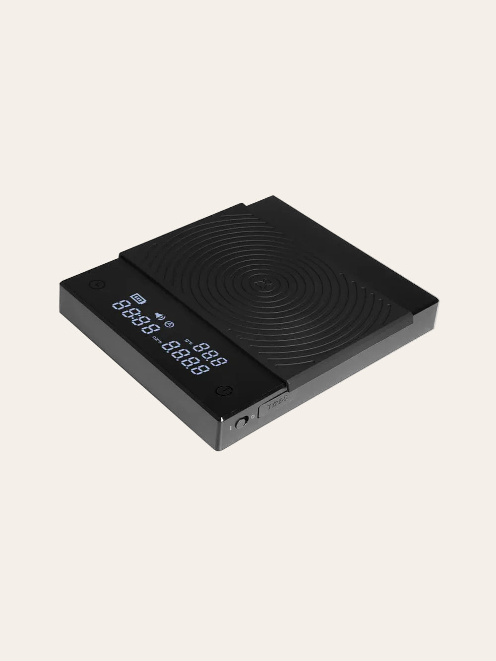 Black electronic scale with digital display on a white background