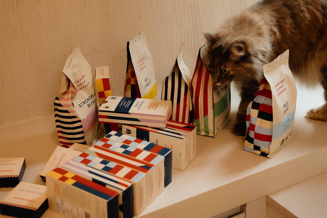 Opal Anne investigating Fernwood bagged coffee and capsules.