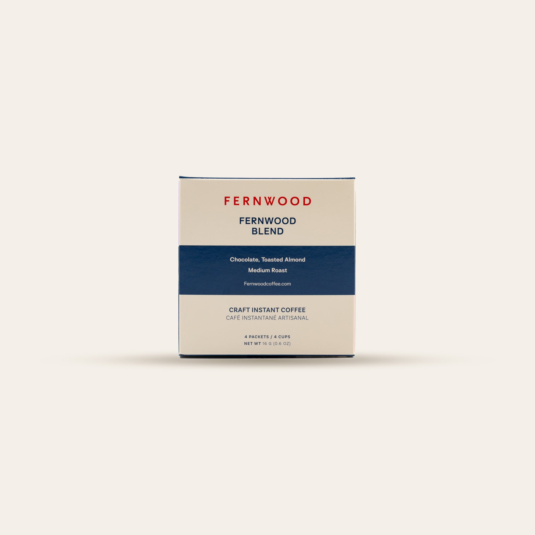Fernwood Blend Instnant Coffee box of four pouches on a beige background.