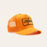 Orange trucker hat with a Fernwood patch on the front on a light beige background
