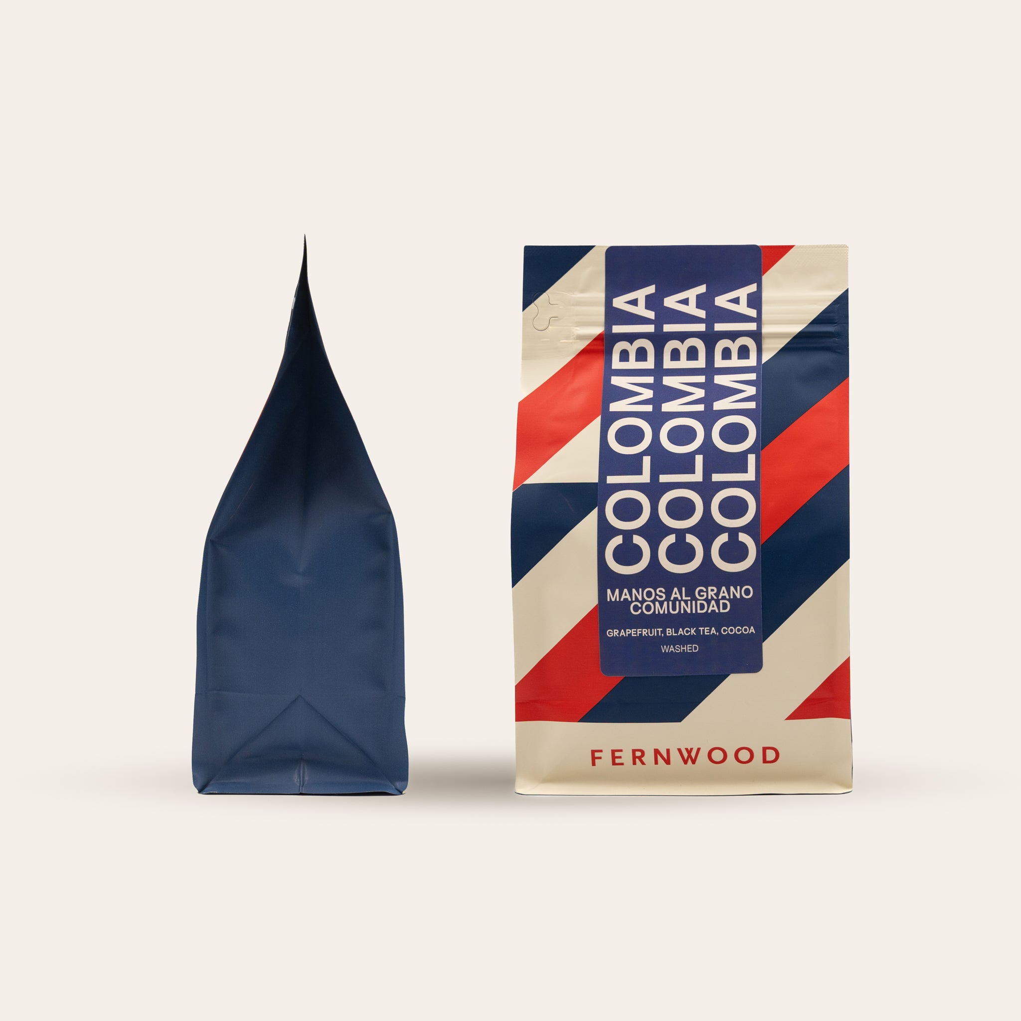 Fernwood Colombia coffee package with a blue and red striped coffee bag on a white background.