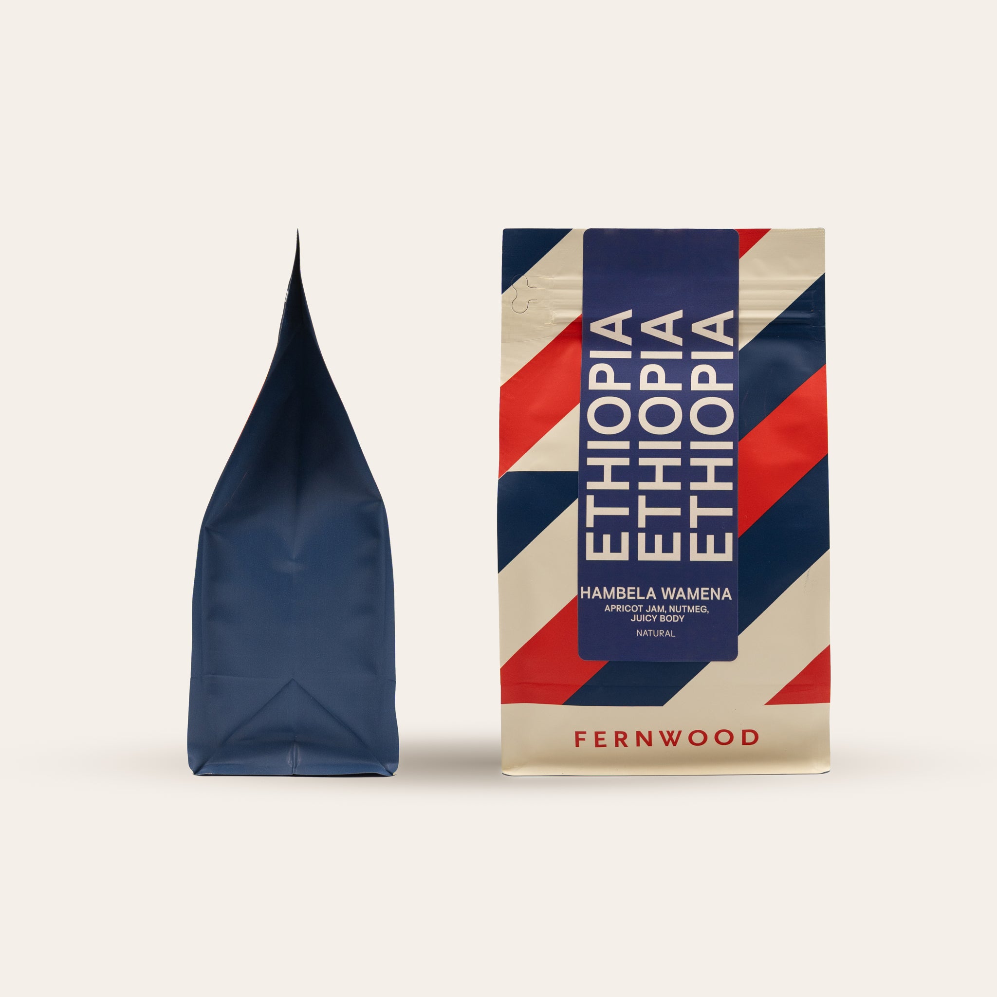 Fernwood Ethiopia coffee package with a blue and red striped coffee bag on a beige background.