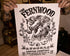 A person holding up a black and white print of a horse with the text 'THE FERNWOOD COFFEE COMPANY' displayed at the top.
